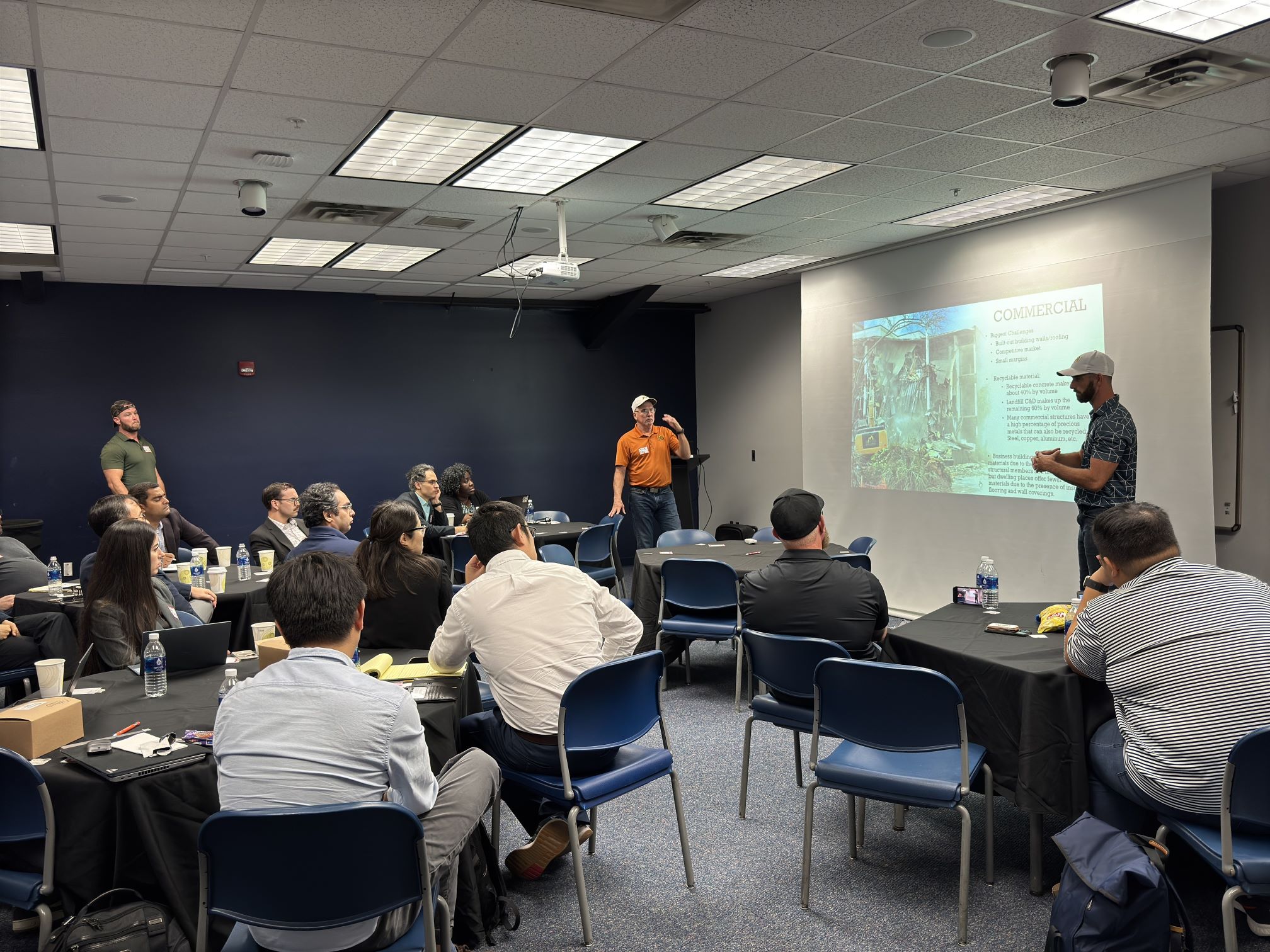 Industry professionals discussing debris removal applications